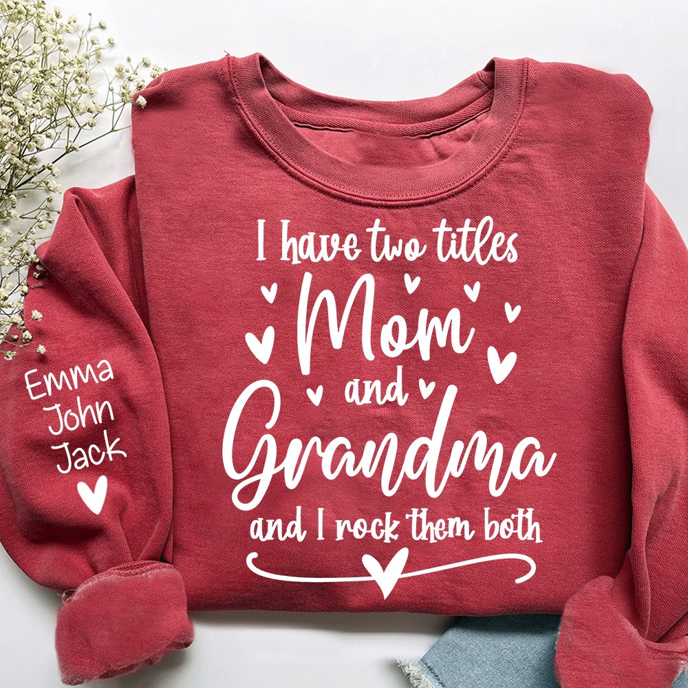 Personalized "I Have Two Titles Mom and Grandma And I Rock Them Both" Sweatshirt, Custom Grandkids Names on Sleeve, Heartwarming Gift for Grandma, Mom, Mimi, Nana, Mother’s Day